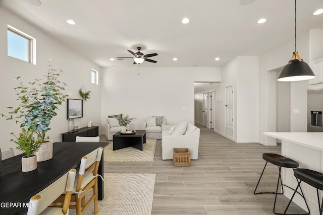 14932 Hill Ridge Ct, El Paso, TX 79938 - living room with recessed lighting, ceiling fan, light wood-style floors, and baseboards