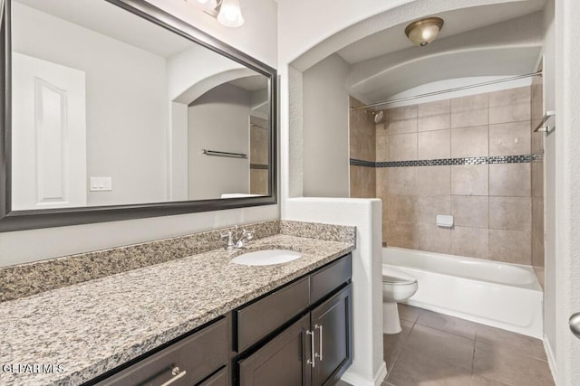14270 Don Johnson, El Paso, TX 79938 - bathroom featuring toilet, vanity, tile patterned flooring, and shower / bathtub combination