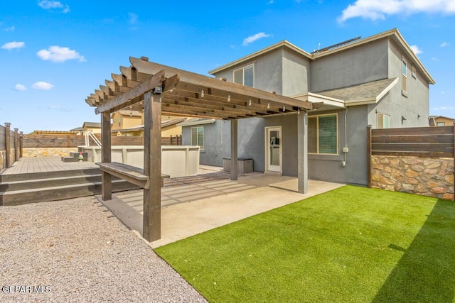 14270 Don Johnson, El Paso, TX 79938 - back of house featuring stucco siding, a wooden deck, a patio area, and a pergola