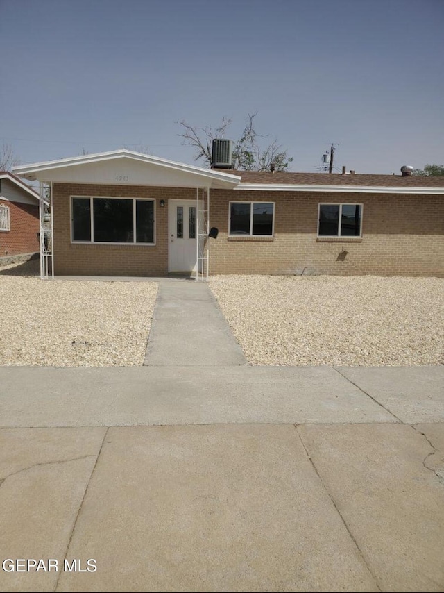 4943 Aiken Ln, El Paso, TX 79924 - view of front of house featuring brick siding and cooling unit