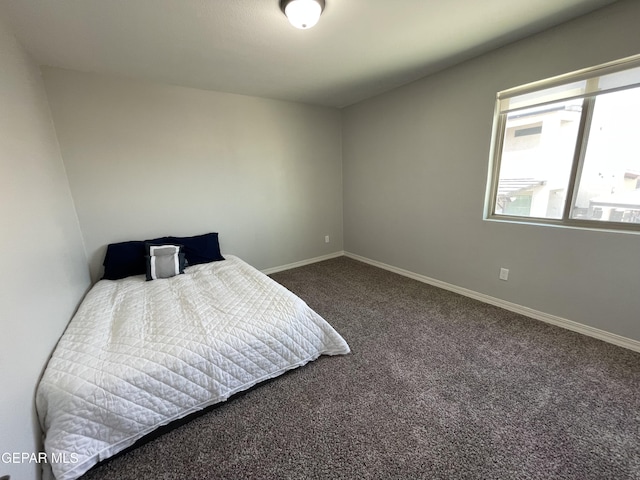 13689 Bradford St, El Paso, TX 79928 - carpeted bedroom with baseboards