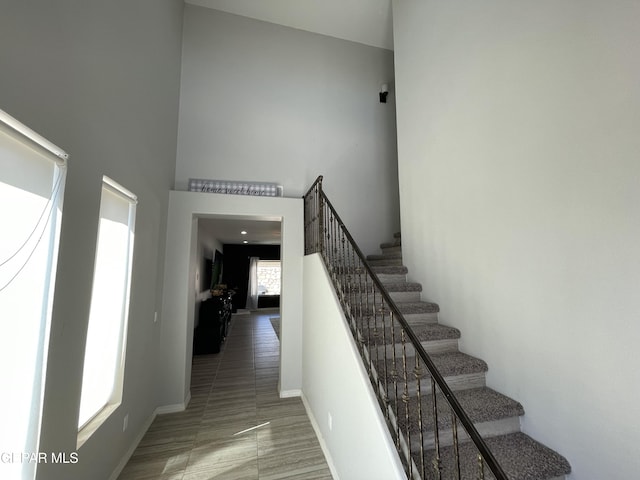 13689 Bradford St, El Paso, TX 79928 - stairs with a high ceiling and baseboards