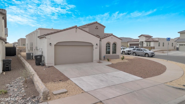 281 Farnborough St, Horizon City, TX 79928 - view of front of home with stucco siding, driveway, a garage, a residential view, and central AC unit