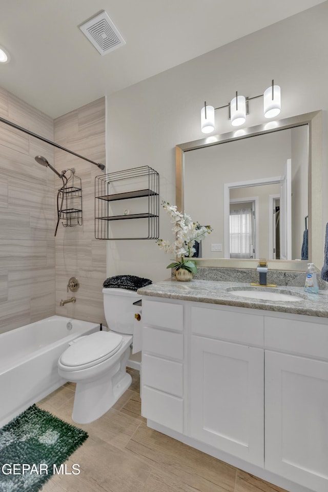 281 Farnborough St, Horizon City, TX 79928 - bathroom with washtub / shower combination, toilet, and vanity