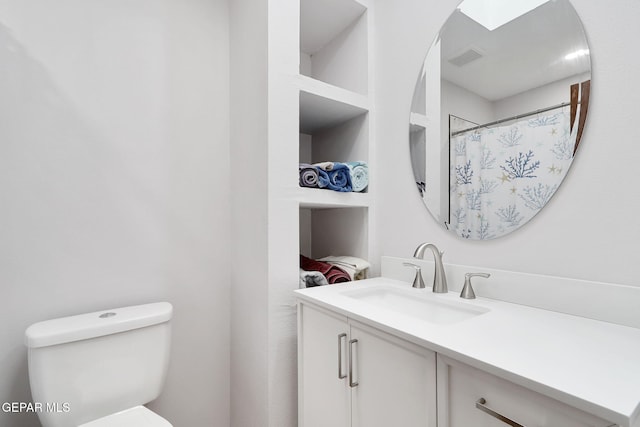 7721 Maya Ave, El Paso, TX 79912 - bathroom with vanity and toilet
