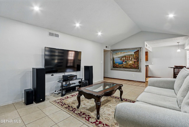 7721 Maya Ave, El Paso, TX 79912 - living area with light tile patterned floors, lofted ceiling, baseboards, and recessed lighting