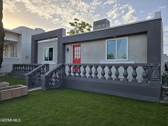 2917 Mobile Ave, El Paso, TX 79930 - view of front of home featuring a lawn and stucco siding