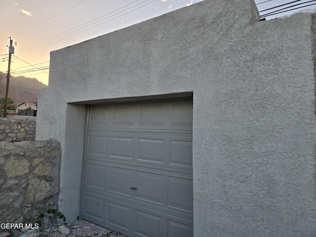 2917 Mobile Ave, El Paso, TX 79930 - view of garage at dusk