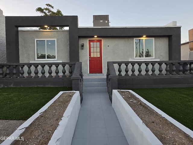 2917 Mobile Ave, El Paso, TX 79930 - view of front of house featuring stucco siding and a front lawn