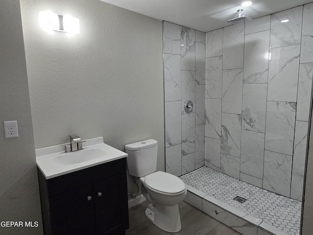2917 Mobile Ave, El Paso, TX 79930 - bathroom with vanity and tiled shower