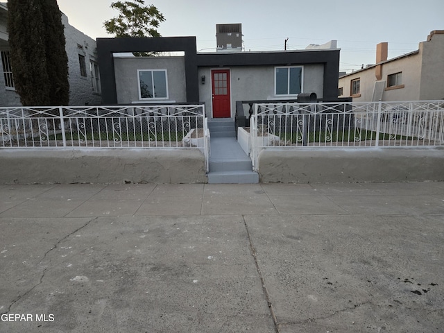 2917 Mobile Ave, El Paso, TX 79930 - view of front of house featuring a fenced front yard and stucco siding
