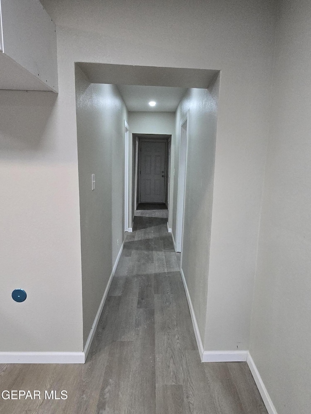 2917 Mobile Ave, El Paso, TX 79930 - hallway featuring dark wood-style floors and baseboards