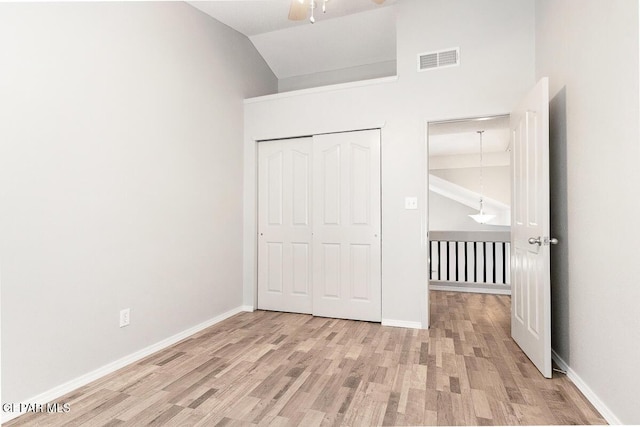 5429 Santiago Roque Dr, El Paso, TX 79934 - unfurnished bedroom featuring wood finished floors, lofted ceiling, a closet, baseboards, and a ceiling fan
