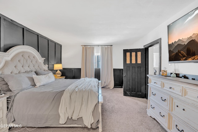 305 N Carolina Dr, El Paso, TX 79915 - bedroom featuring light colored carpet and wainscoting