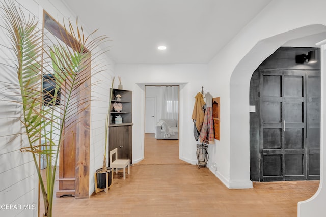 305 N Carolina Dr, El Paso, TX 79915 - hallway with arched walkways, wood finished floors, baseboards, and recessed lighting