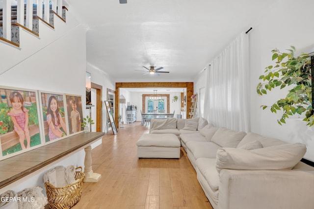 305 N Carolina Dr, El Paso, TX 79915 - living area with a ceiling fan, light wood-style floors, and stairs