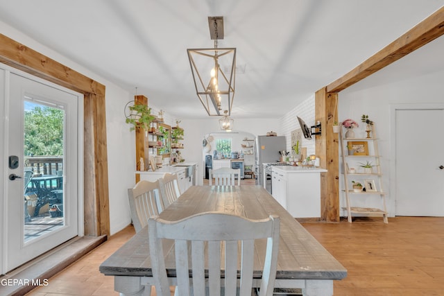 305 N Carolina Dr, El Paso, TX 79915 - dining room featuring healthy amount of natural light and light wood finished floors
