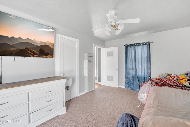 305 N Carolina Dr, El Paso, TX 79915 - bedroom featuring light colored carpet, a heating unit, ceiling fan, and baseboards