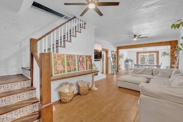 305 N Carolina Dr, El Paso, TX 79915 - living room with ceiling fan, stairway, wood finished floors, and baseboards