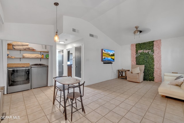 305 N Carolina Dr, El Paso, TX 79915 - kitchen featuring lofted ceiling, light tile patterned flooring, washer and clothes dryer, open shelves, and fridge