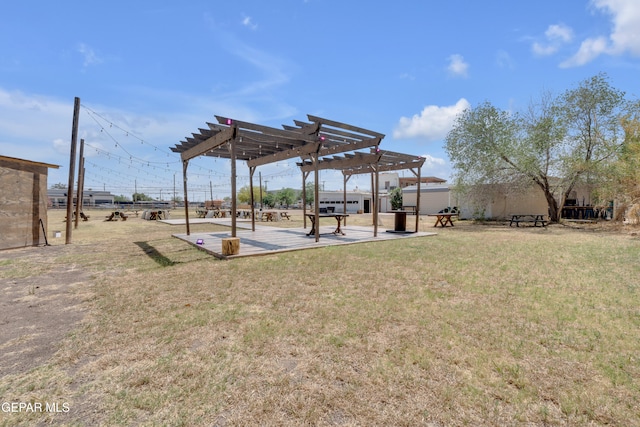 305 N Carolina Dr, El Paso, TX 79915 - view of grassy yard with a pergola and a patio area
