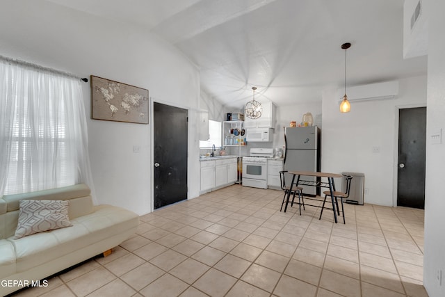 305 N Carolina Dr, El Paso, TX 79915 - kitchen with white appliances, a sink, vaulted ceiling, light tile patterned floors, and light countertops