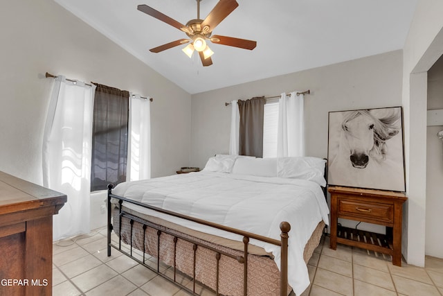 305 N Carolina Dr, El Paso, TX 79915 - bedroom with lofted ceiling, light tile patterned floors, and ceiling fan