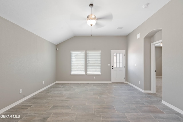 1329 Madero Ave, El Paso, TX 79928 - entrance foyer with a ceiling fan, arched walkways, vaulted ceiling, and baseboards