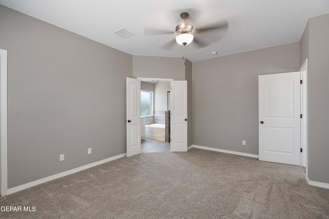 1329 Madero Ave, El Paso, TX 79928 - unfurnished bedroom with carpet, baseboards, connected bathroom, and ceiling fan