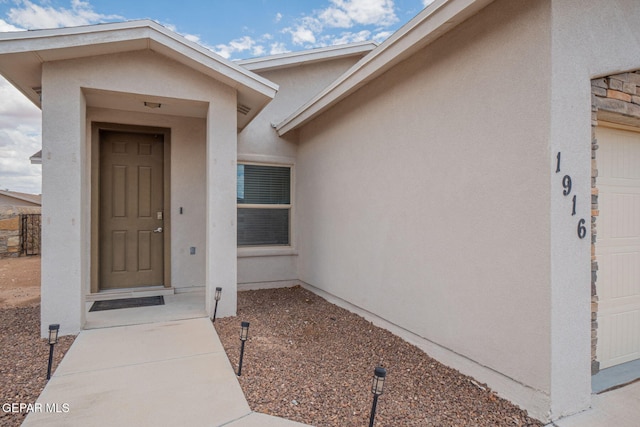 1916 William Caples St, El Paso, TX 79938 - view of exterior entry with stucco siding