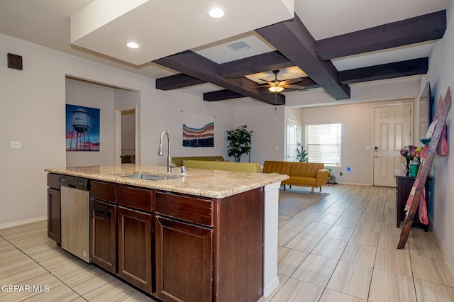 1916 William Caples St, El Paso, TX 79938 - kitchen featuring a sink, dishwasher, a ceiling fan, a center island with sink, and beamed ceiling