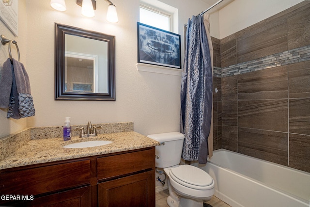 1916 William Caples St, El Paso, TX 79938 - bathroom with vanity, toilet, and shower / bathtub combination with curtain