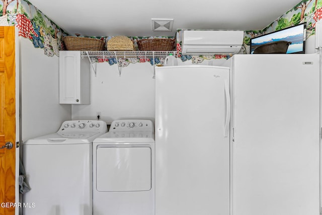 5436 La Estancia Cir, El Paso, TX 79932 - laundry area with washer and dryer, an AC wall unit, and cabinet space