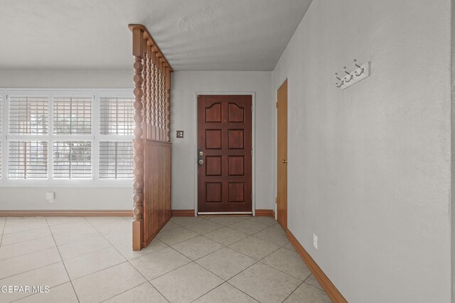 904 Apple Ln, El Paso, TX 79925 - entrance foyer featuring baseboards and light tile patterned floors