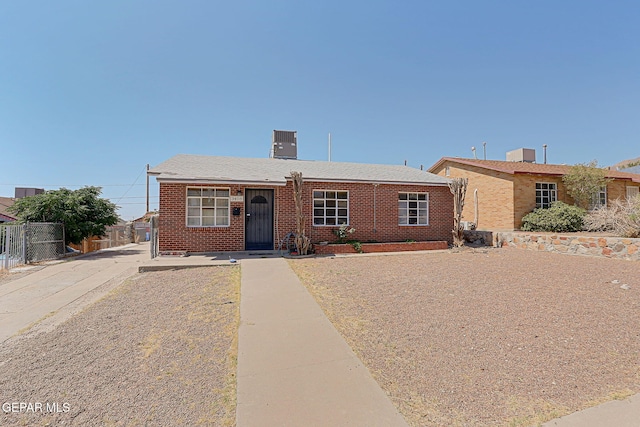 3408 Pierce Ave, El Paso, TX 79930 - ranch-style house with brick siding and cooling unit