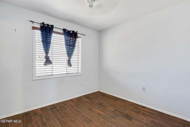 3408 Pierce Ave, El Paso, TX 79930 - unfurnished room with wood tiled floors, baseboards, and a ceiling fan