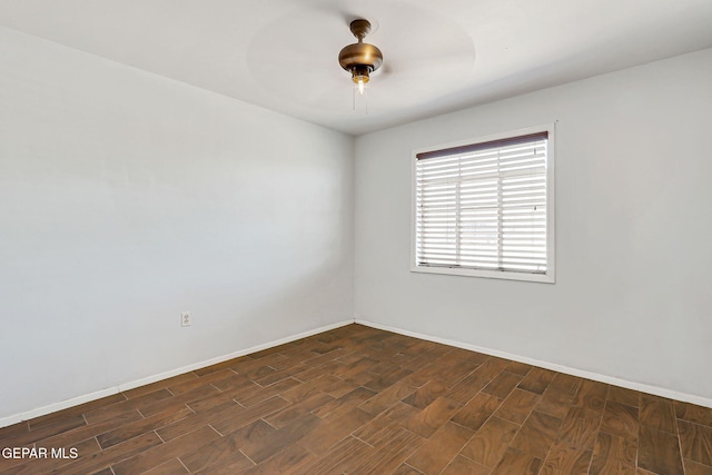 3408 Pierce Ave, El Paso, TX 79930 - unfurnished room with wood tiled floors, baseboards, and a ceiling fan