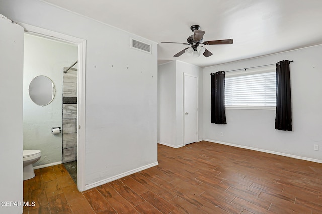 3408 Pierce Ave, El Paso, TX 79930 - empty room with a ceiling fan, wood finished floors, and baseboards