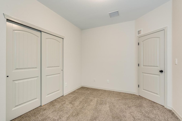 1361 Indigo Sky St, El Paso, TX 79928 - unfurnished bedroom with light carpet, a closet, and baseboards
