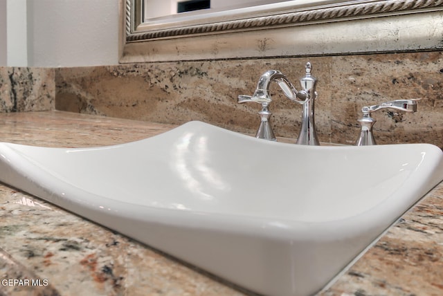 5814 Beaumont Pl, El Paso, TX 79912 - bathroom view of a sink and tasteful backsplash