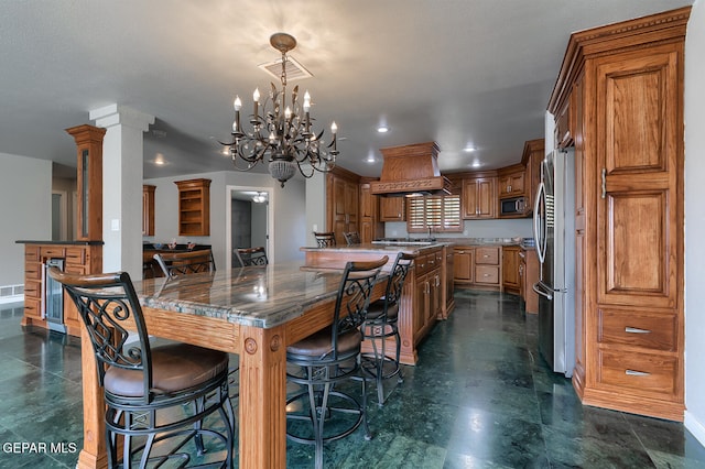 5814 Beaumont Pl, El Paso, TX 79912 - dining area with a chandelier, baseboards, and recessed lighting