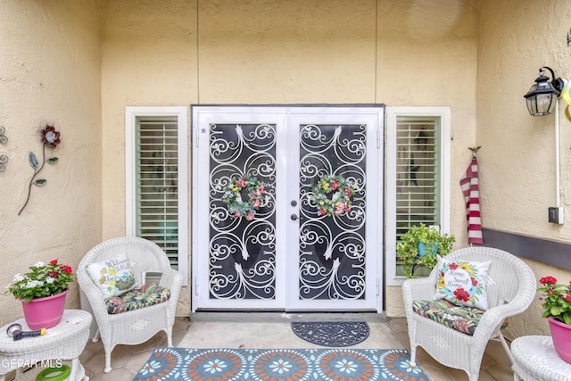 10605 Park View Cir, El Paso, TX 79935 - property entrance featuring stucco siding and french doors