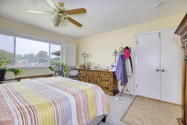 10605 Park View Cir, El Paso, TX 79935 - bedroom with light tile patterned floors and ceiling fan