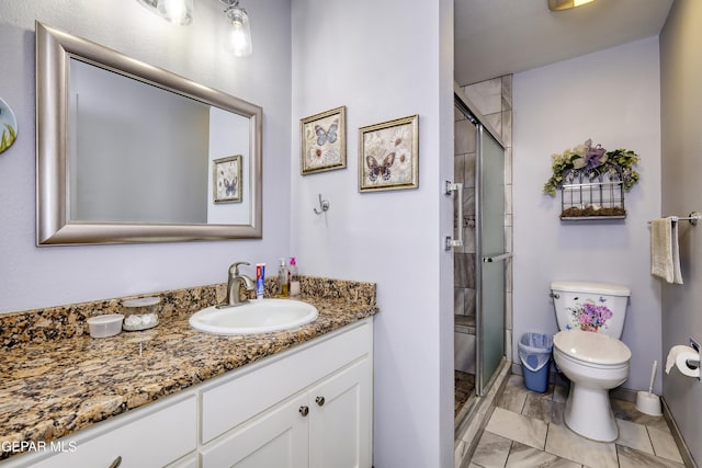 10605 Park View Cir, El Paso, TX 79935 - bathroom featuring vanity, toilet, a shower stall, and marble finish floors