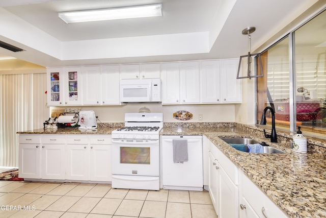 10605 Park View Cir, El Paso, TX 79935 - kitchen with white appliances, a sink, white cabinets, and light tile patterned flooring