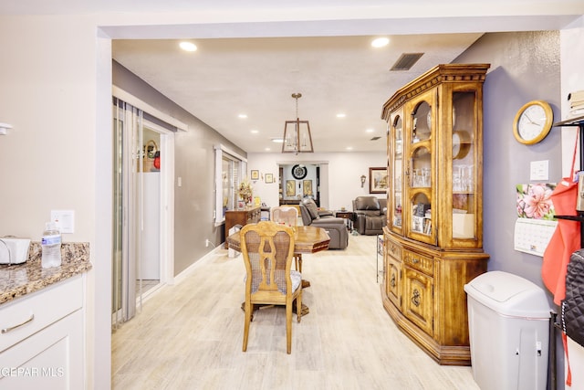 10605 Park View Cir, El Paso, TX 79935 - dining room with light wood-style flooring and recessed lighting