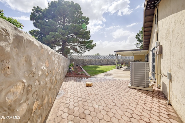 10605 Park View Cir, El Paso, TX 79935 - fenced backyard featuring cooling unit and a patio