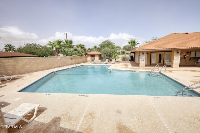 10605 Park View Cir, El Paso, TX 79935 - community pool featuring a patio area