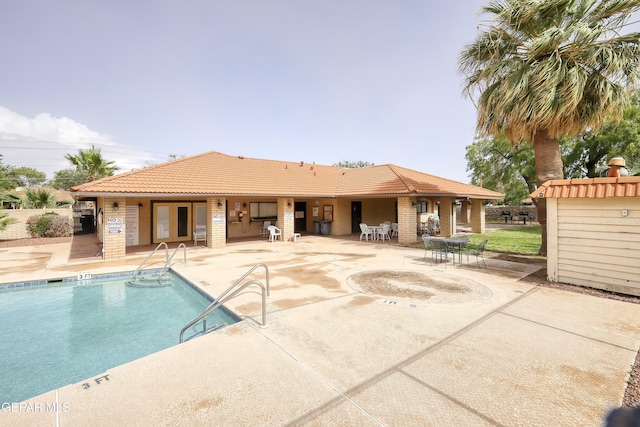 10605 Park View Cir, El Paso, TX 79935 - community pool featuring a patio