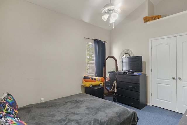 14407 Ocean Point Ln, El Paso, TX 79938 - bedroom featuring dark carpet, vaulted ceiling, a closet, and a ceiling fan